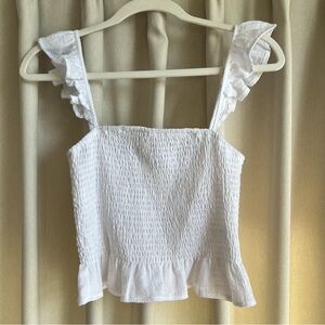 Quiet Storm white smocked ruffle top